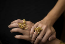 Load image into Gallery viewer, 18 karat gold and diamond cocktail rings rings on model&#39;s hands, making a bold statement. 